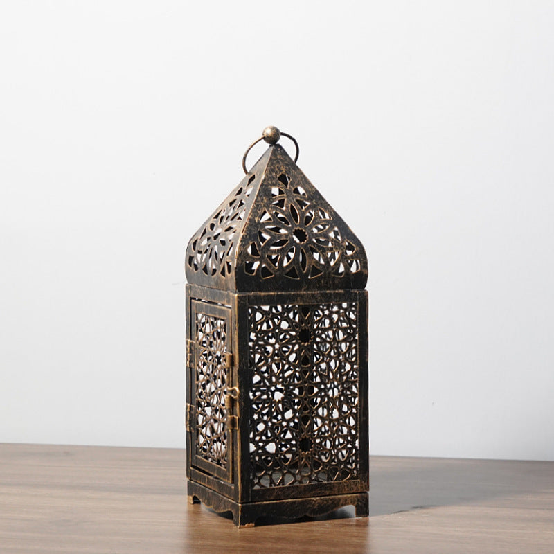Hollow iron candle holder