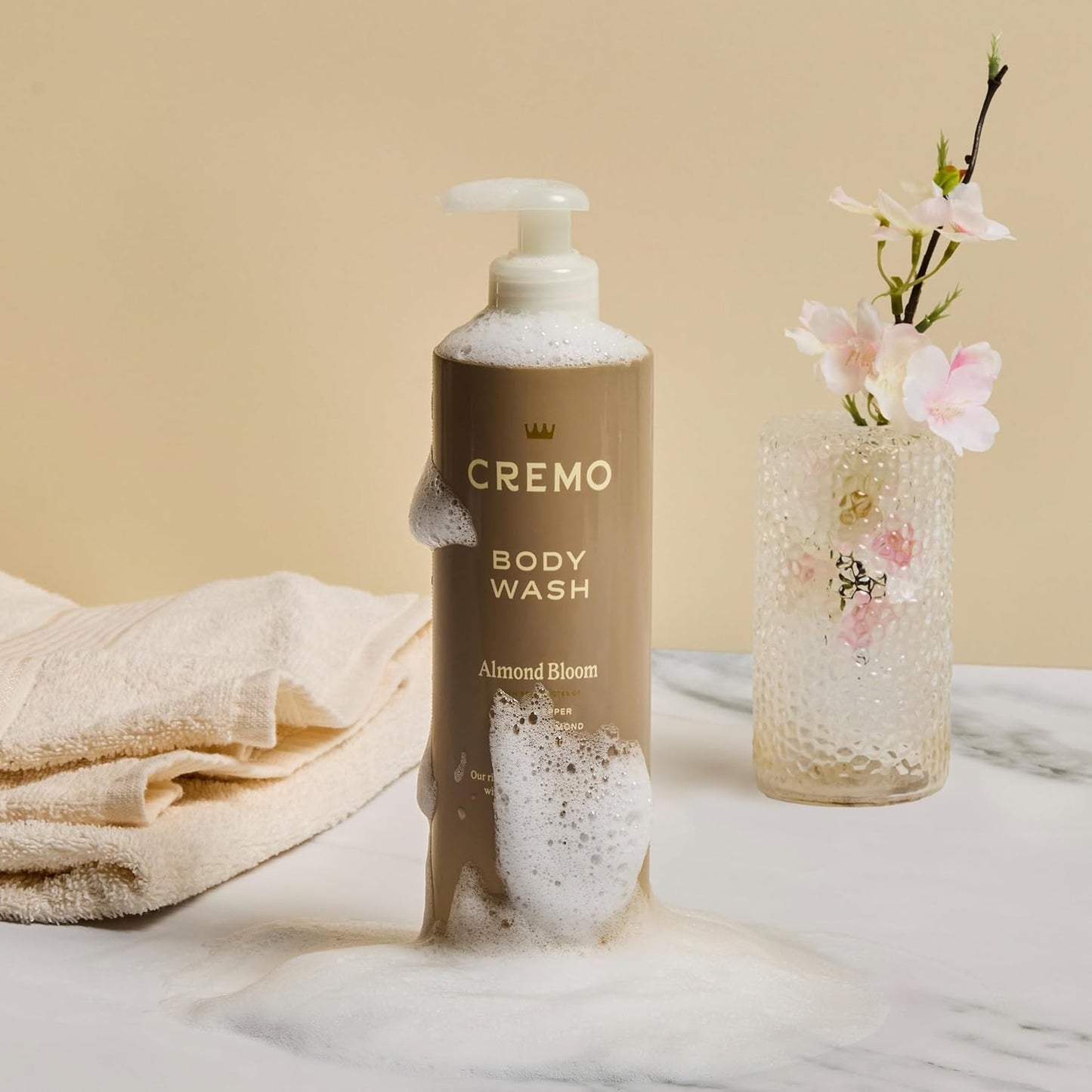 Dluxe Ave. Cremo Skin Moisturizing Almond Bloom Womens Body Wash Notes of Spicy Pink Pepper Creamy Almond and Soft Suede 16 Fl Oz