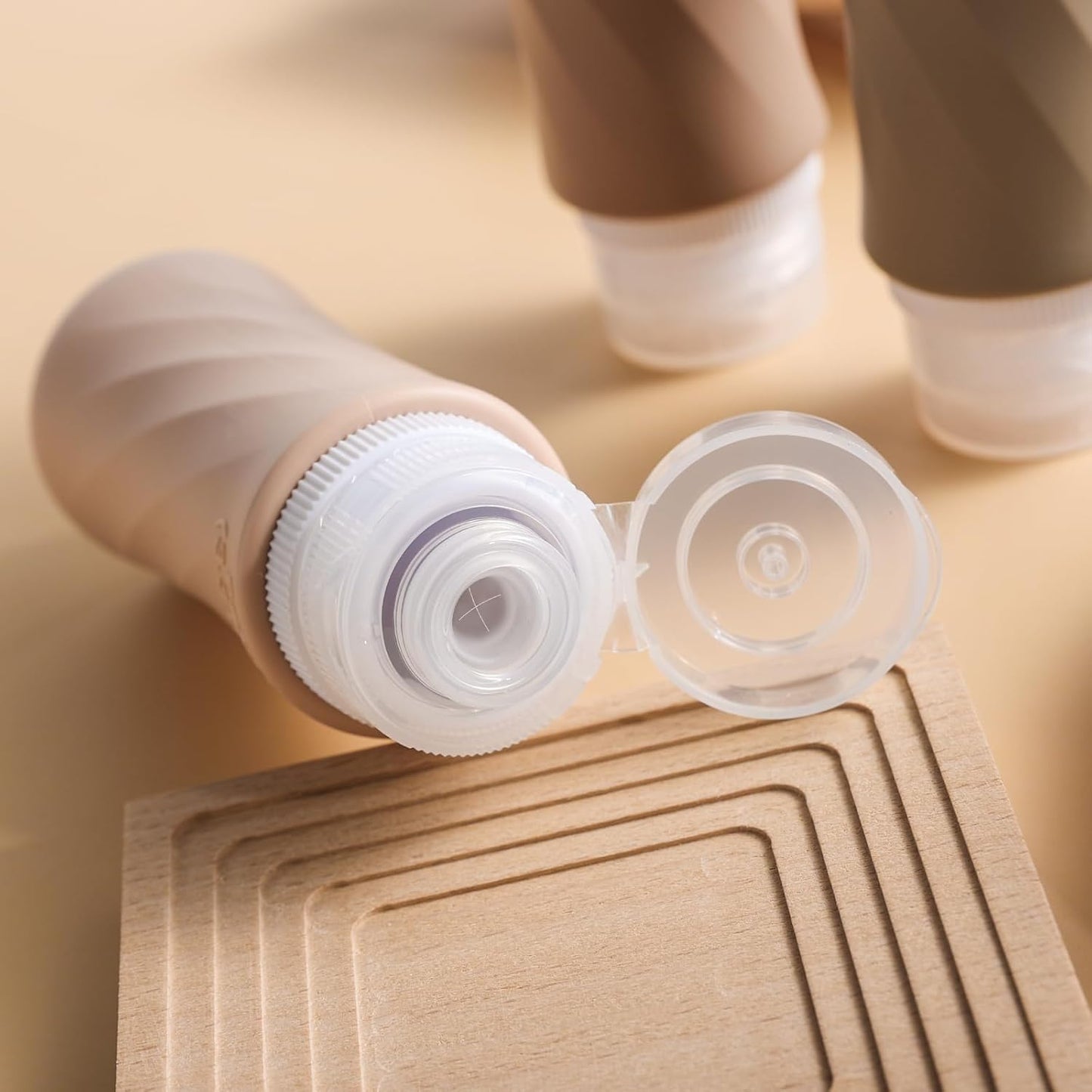 Dluxe Ave. Travel Bottles for Toiletries/ TSA Approved/ 3.3oz Portable/ BPA Free Leak Proof/ Squeezable Silicone/ 4 Pack