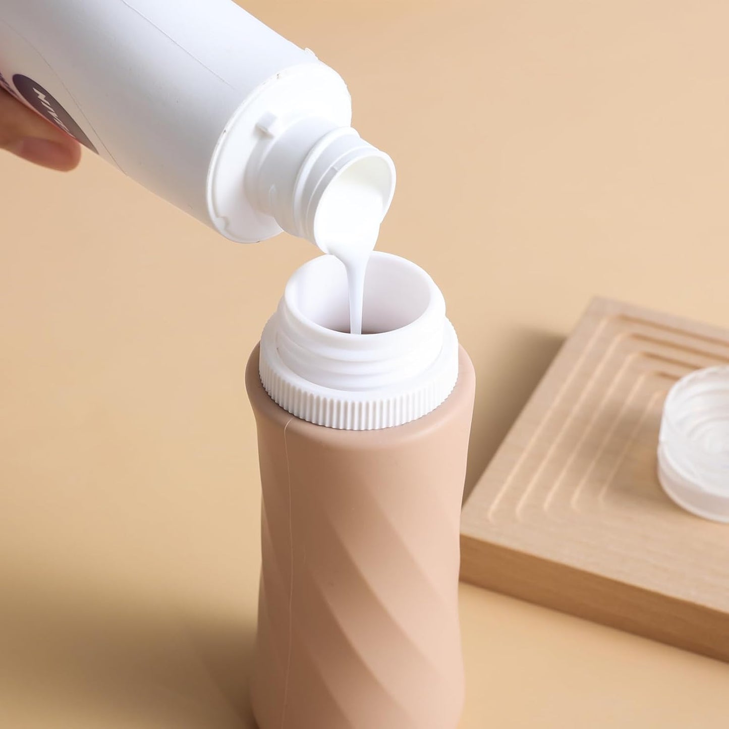 Dluxe Ave. Travel Bottles for Toiletries/ TSA Approved/ 3.3oz Portable/ BPA Free Leak Proof/ Squeezable Silicone/ 4 Pack