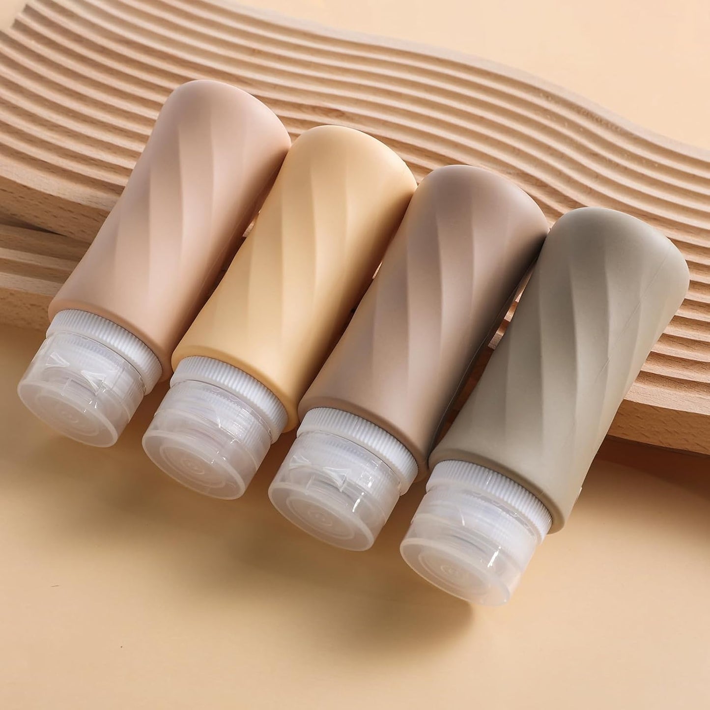 Dluxe Ave. Travel Bottles for Toiletries/ TSA Approved/ 3.3oz Portable/ BPA Free Leak Proof/ Squeezable Silicone/ 4 Pack