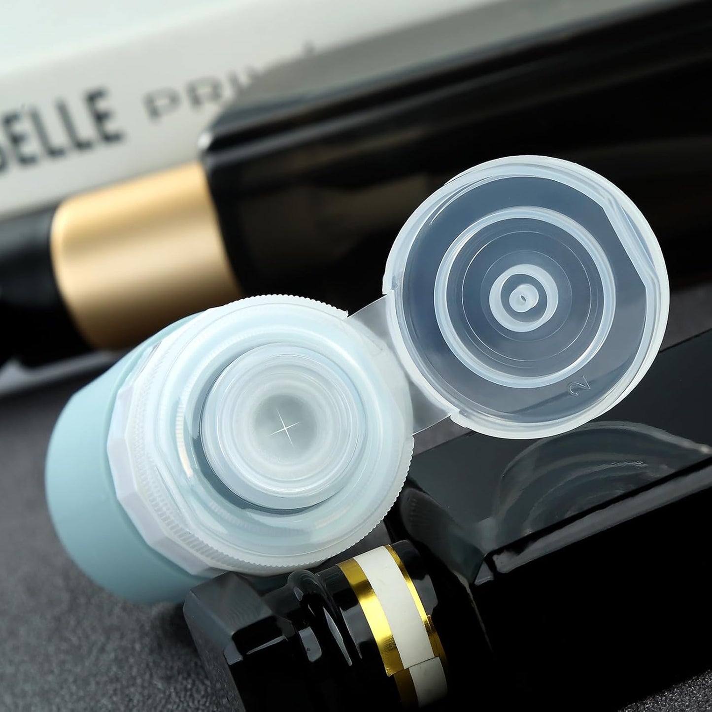 Dluxe Ave. Travel Bottles for Toiletries/ TSA Approved/ 2oz Travel size Bottles/ BPA Free/ 4 Pack