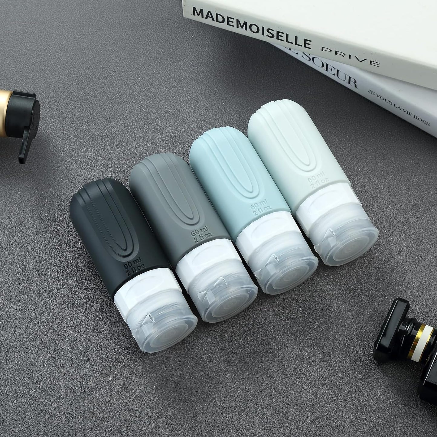 Dluxe Ave. Travel Bottles for Toiletries/ TSA Approved/ 2oz Travel size Bottles/ BPA Free/ 4 Pack