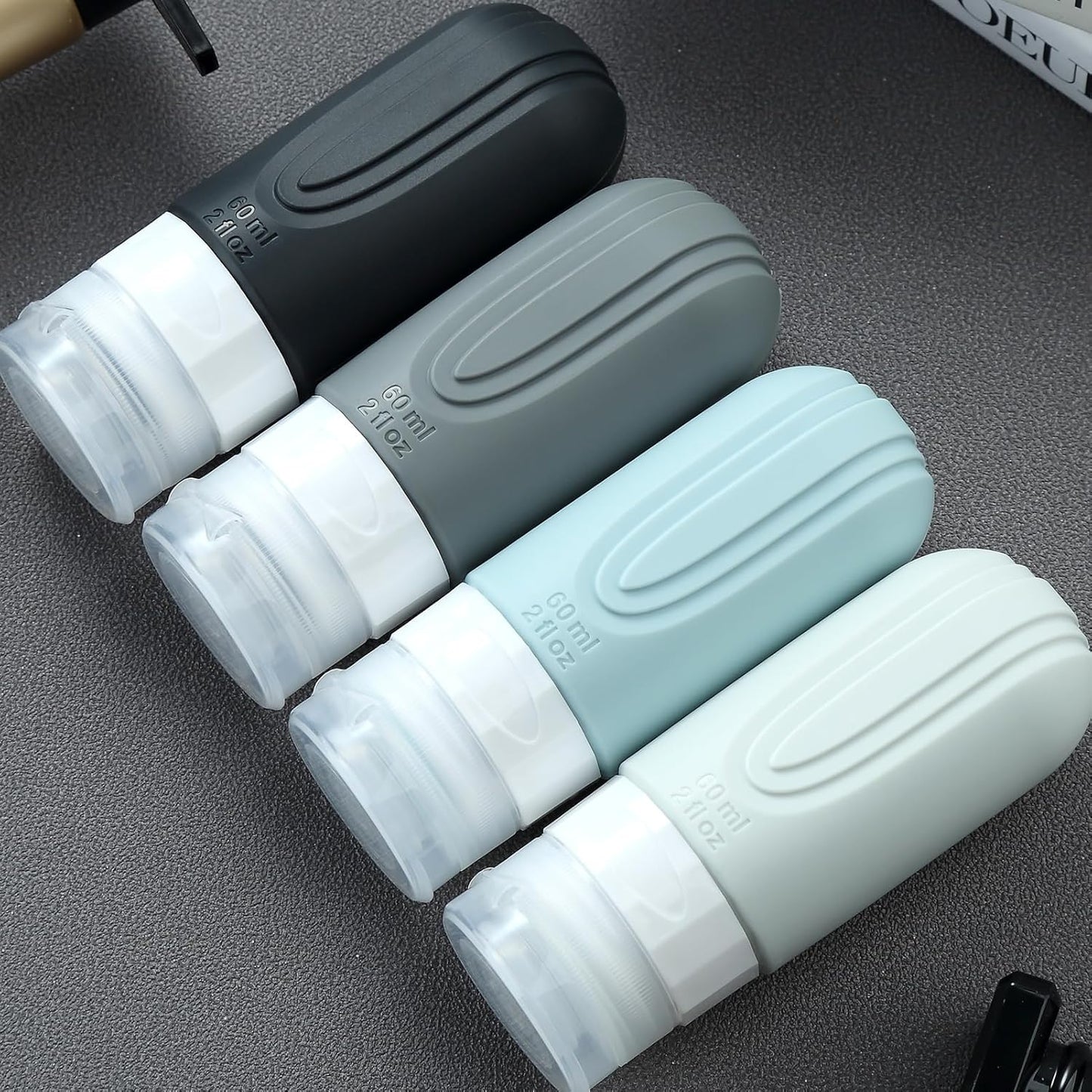 Dluxe Ave. Travel Bottles for Toiletries/ TSA Approved/ 2oz Travel size Bottles/ BPA Free/ 4 Pack
